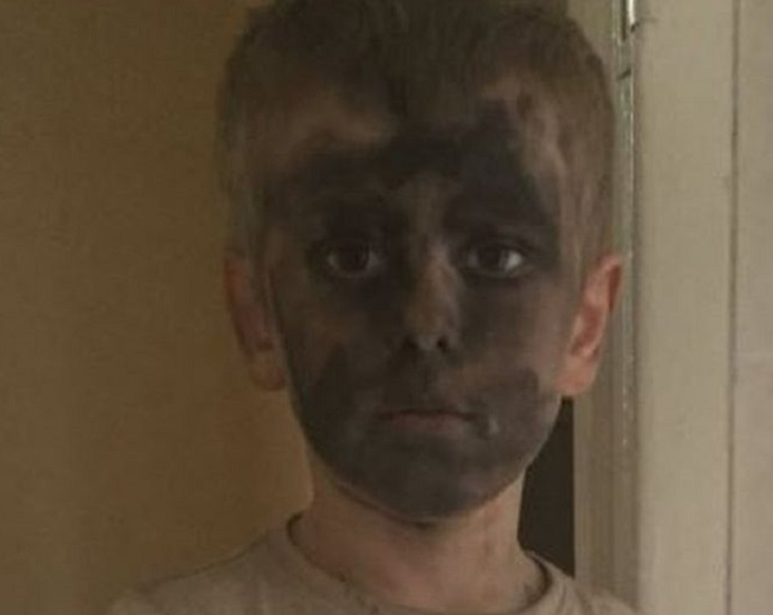 Boy`s smeared make-up face goes viral after Mum shares it